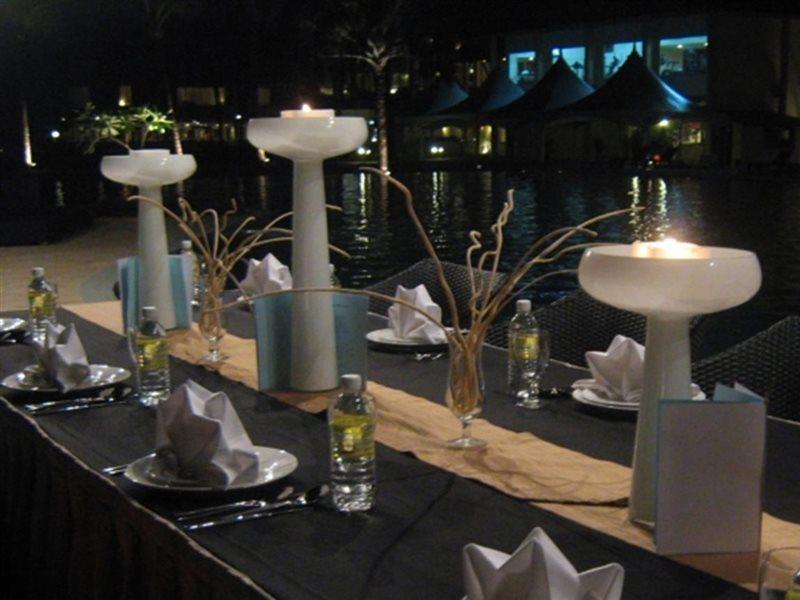 Damai Puri Resort & Spa Kuching Bagian luar foto A table set for a formal dinner